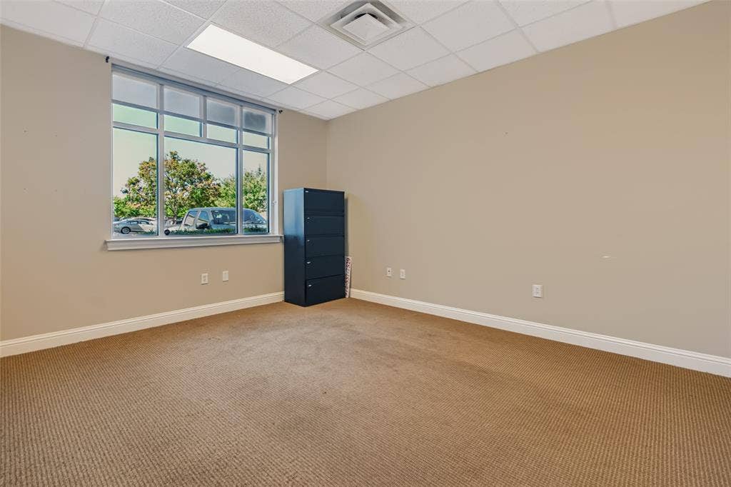 3900 S Stonebridge Drive, #203, McKinney, TX 75070 Recessed lighting and a drop ceiling