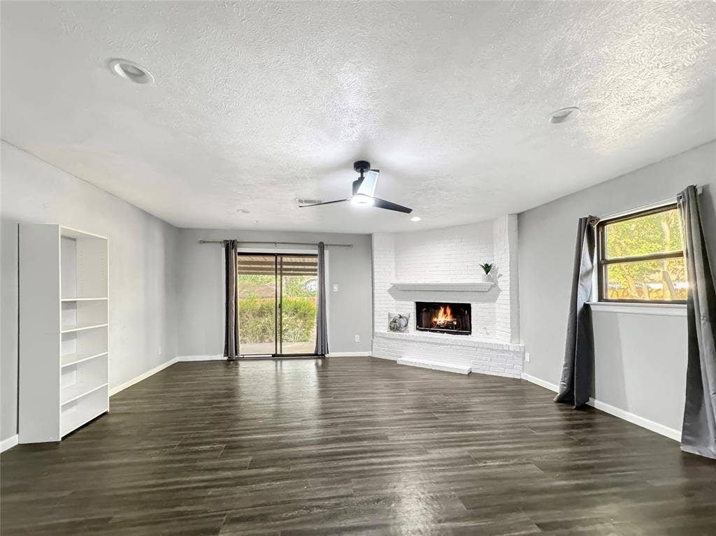 4331 Kolloch Drive, Dallas, TX 75216 Double Doors open to a patio and a huge backyard.