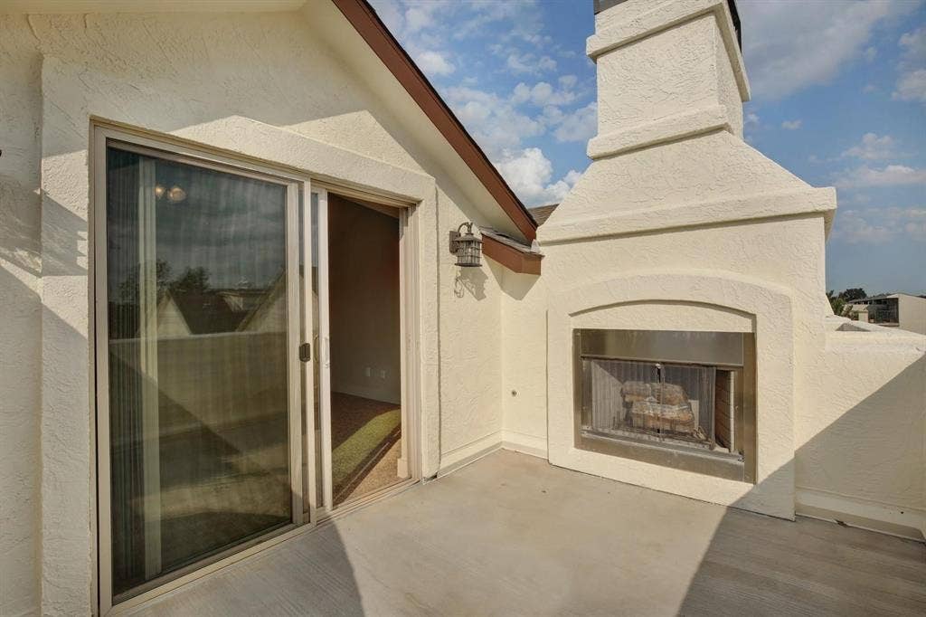 Outdoor fireplace with a stainless steel firebox