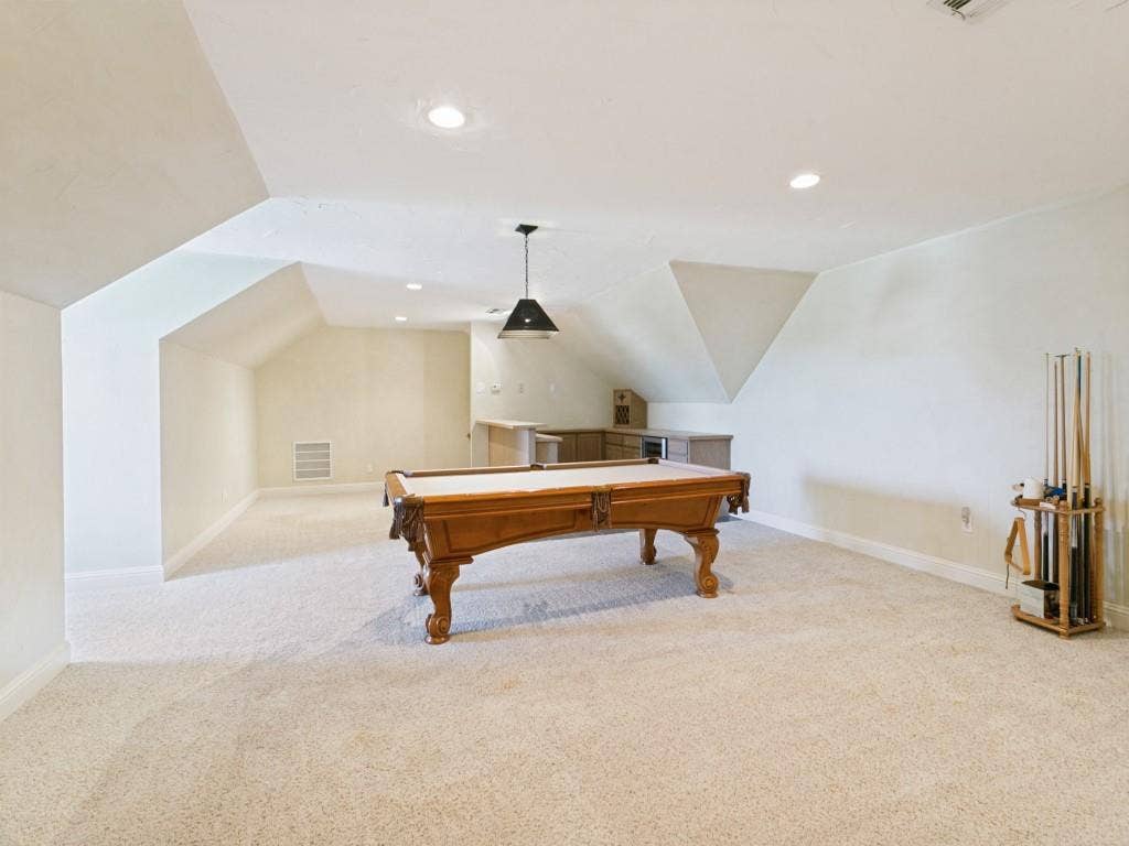 508 Singing Quail Trail, Haslet, TX 76052 Spacious bonus room featuring neutral carpeting, recessed ceiling lighting, a pendant fixture, and a built-in wet bar with cabinetry
