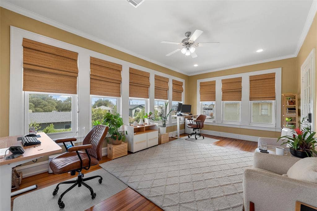 2424 Austin Avenue, Waco, TX 76701 Hardwood flooring, crown molding, abundant natural light, ceiling fan, and recessed lighting