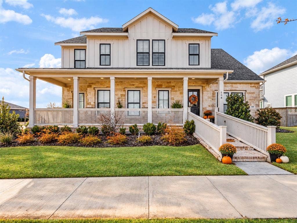 508 N Pecan Parkway, Northlake, TX 76247 Stone and board-and-batten exterior with an expansive covered porch