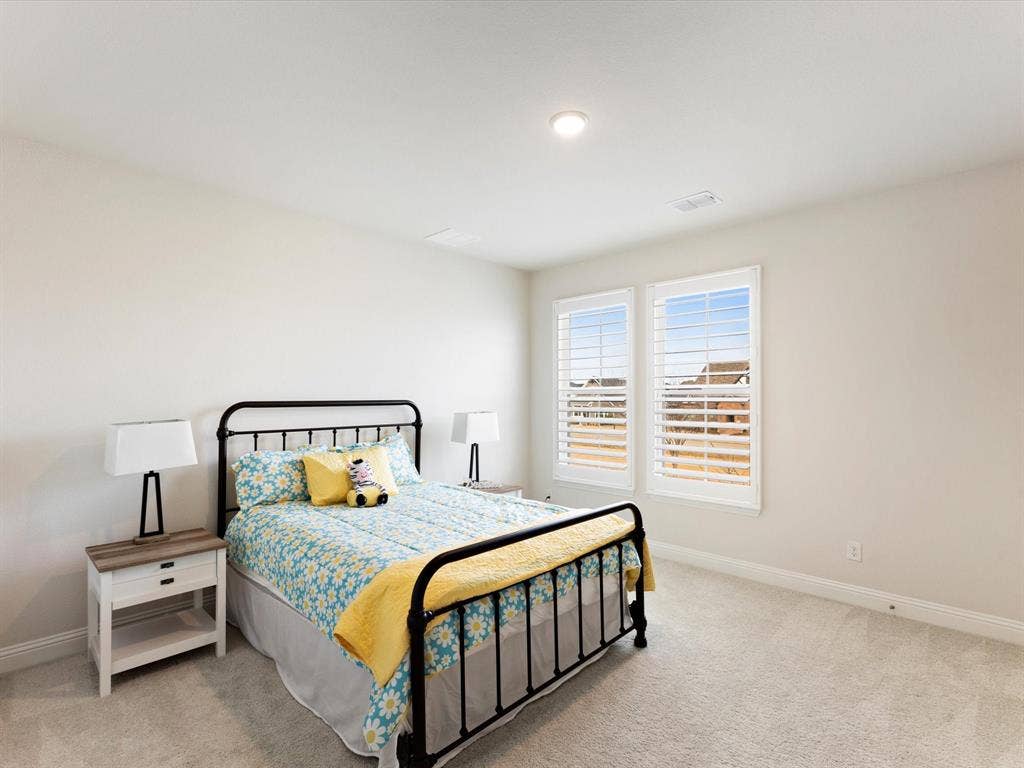 508 N Pecan Parkway, Northlake, TX 76247 Recessed ceiling lighting, dual windows with plantation shutters, neutral-toned carpeting, and light wall finishes