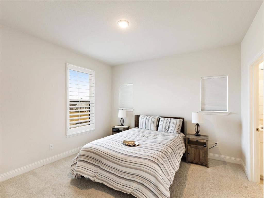 508 N Pecan Parkway, Northlake, TX 76247 Recessed ceiling lighting, white walls, carpet flooring, window with white plantation shutters, and a second window with a white blind
