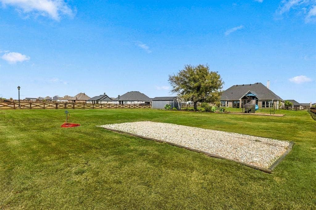 3424 Stardust Lane, Northlake, TX 76226 Utility area where seller parks a trailer. Double gate access on Dakota Rd.
