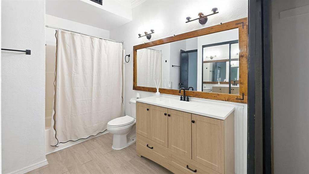 1700 Amelia Court, #126, Plano, TX 75075 Mirrored closets in primary bathroom