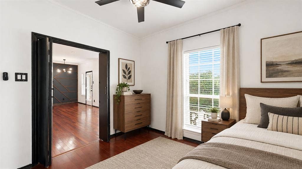 1700 Amelia Court, #126, Plano, TX 75075 Rich wood-finish flooring, ceiling fan, and a large window with blinds Virtually Staged