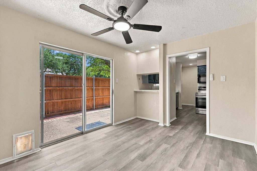 Wood-finish flooring with a ceiling fan