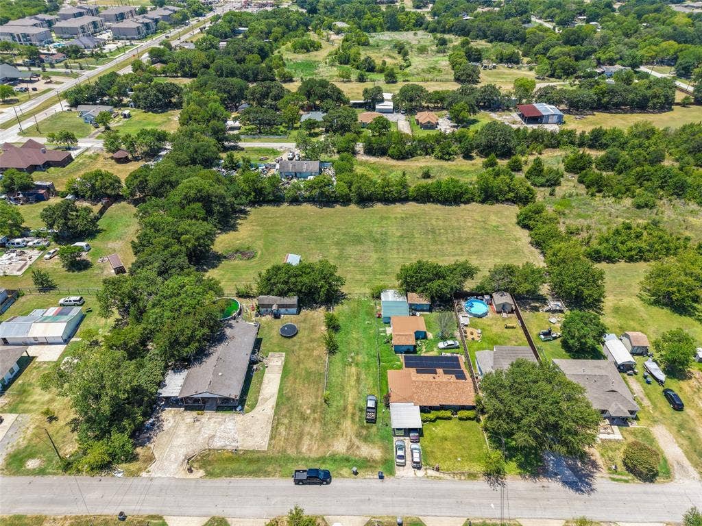 74 Sarah Lane, Dallas, TX 75253 Aerial perspective highlighting expansive green spaces and established surrounding properties