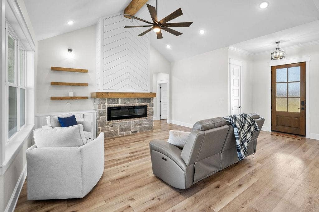 16139 Eagle Lane, Lindale, TX 75771 Vaulted ceiling with an exposed wood beam, contemporary ceiling fan, and recessed lighting
