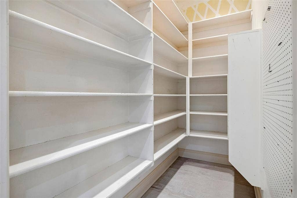 8141 Rosemont Drive, Plano, TX 75025 Huge pantry with wall to hang pot lids, pots, or anything.