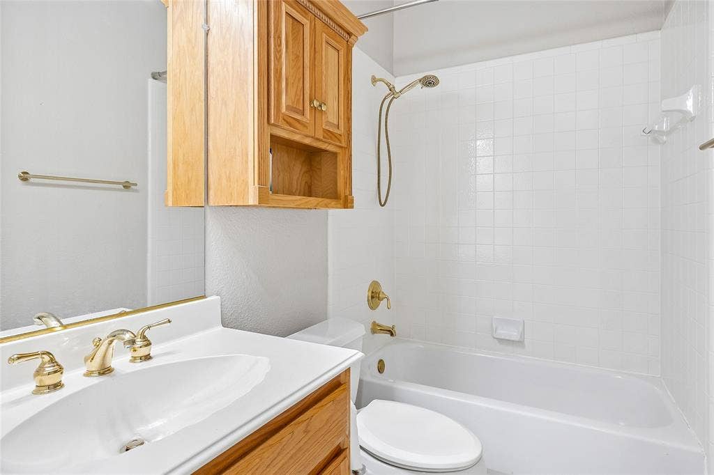 8141 Rosemont Drive, Plano, TX 75025 Bathroom with full size tub and extra cabinets