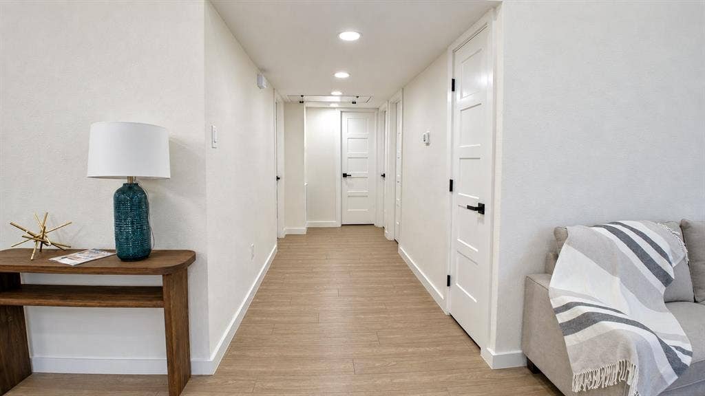 2417 Via Barcelona, Carrollton, TX 75006 Bright hallway featuring recessed lighting and wood-finish flooring