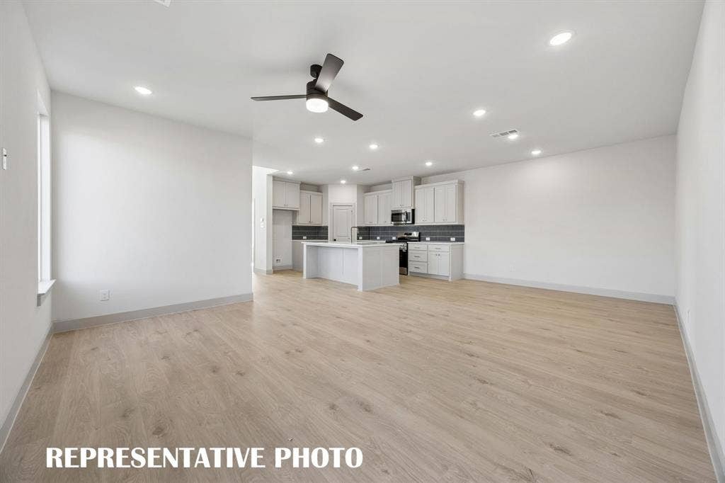633 Taylor Parkway, Celina, TX 75009 The entire family will love gathering in this chamring family room. REPRESENTATIVE PHOTO