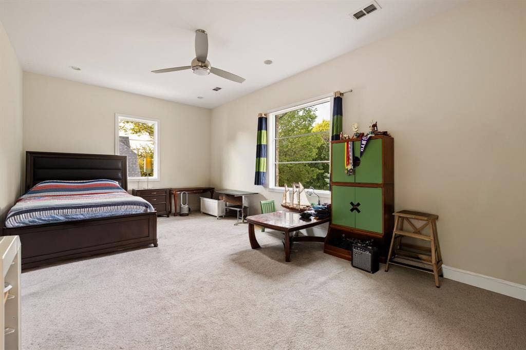 5724 Charlestown Drive, Dallas, TX 75230 Expansive room featuring light-colored walls, recessed lighting, and a ceiling fan
