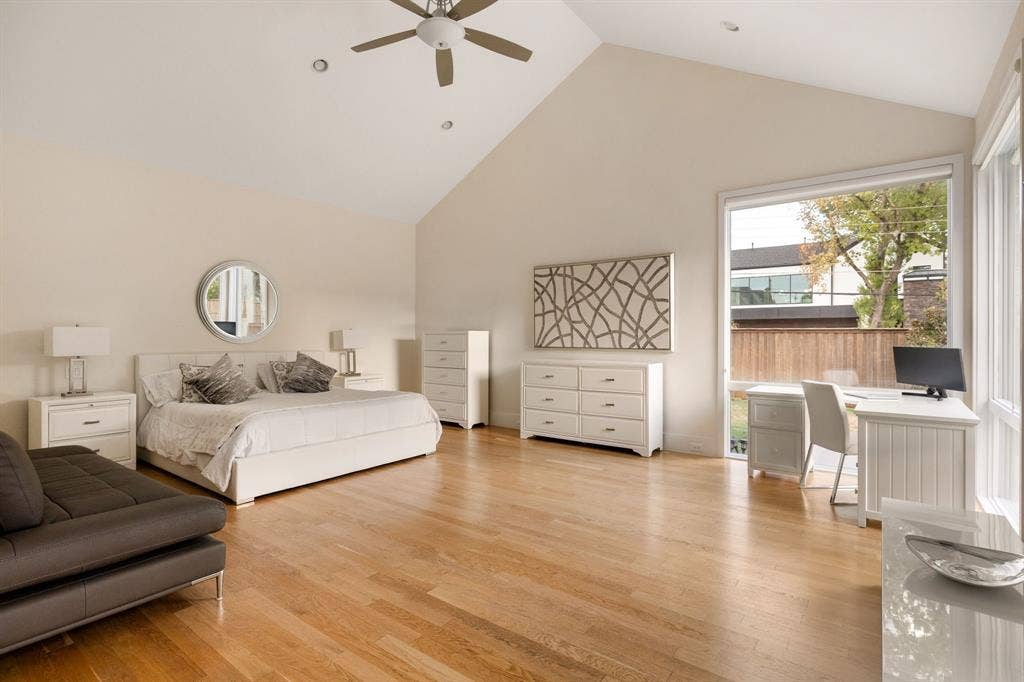 5724 Charlestown Drive, Dallas, TX 75230 Vaulted ceilings featuring a ceiling fan, recessed lighting, wood-finish flooring, and large windows