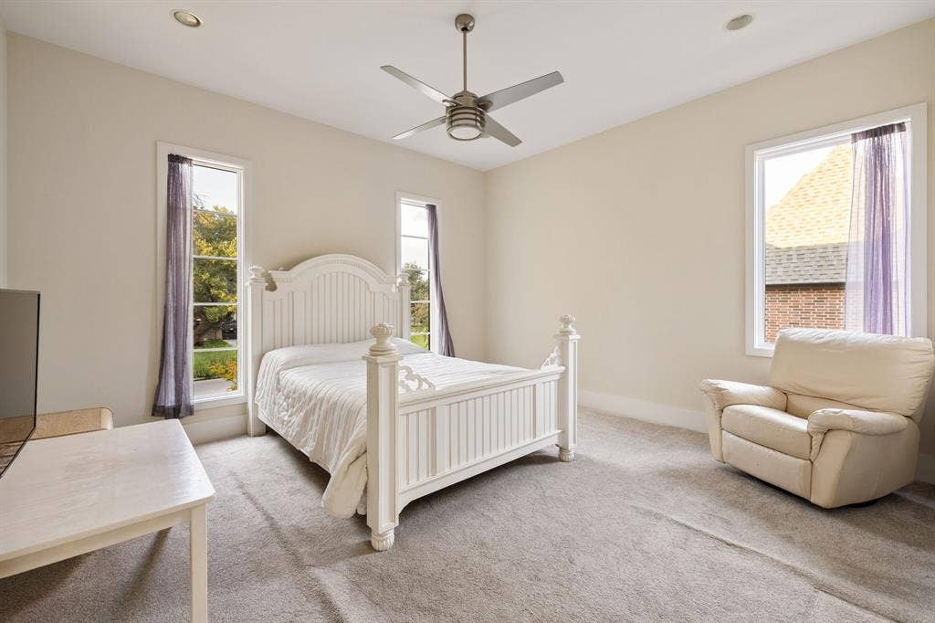 5724 Charlestown Drive, Dallas, TX 75230 Bright room featuring recessed lighting, a ceiling fan, and multiple windows