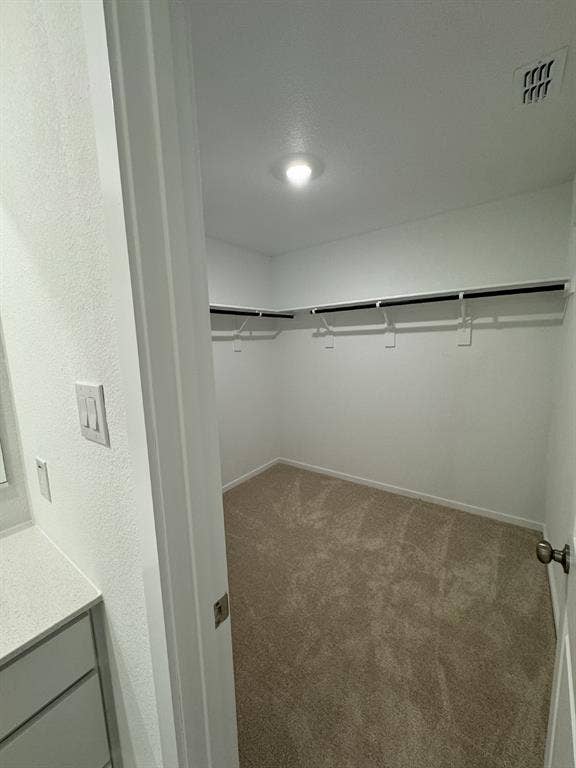 7908 Gilbert Street, McKinney, TX 75071 Light wood-finish flooring, white walls, recessed ceiling lighting, and a paneled entry door