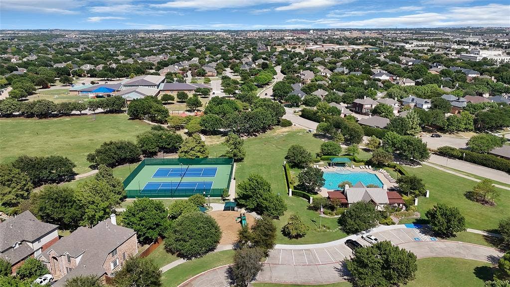 1687 Garrison Drive, Frisco, TX 75033 Enjoy the wonderful amenities of The Trails. 2 community pools, tennis courts, greenbelts, playgrounds, fishing pond and miles of scenic walking trails.