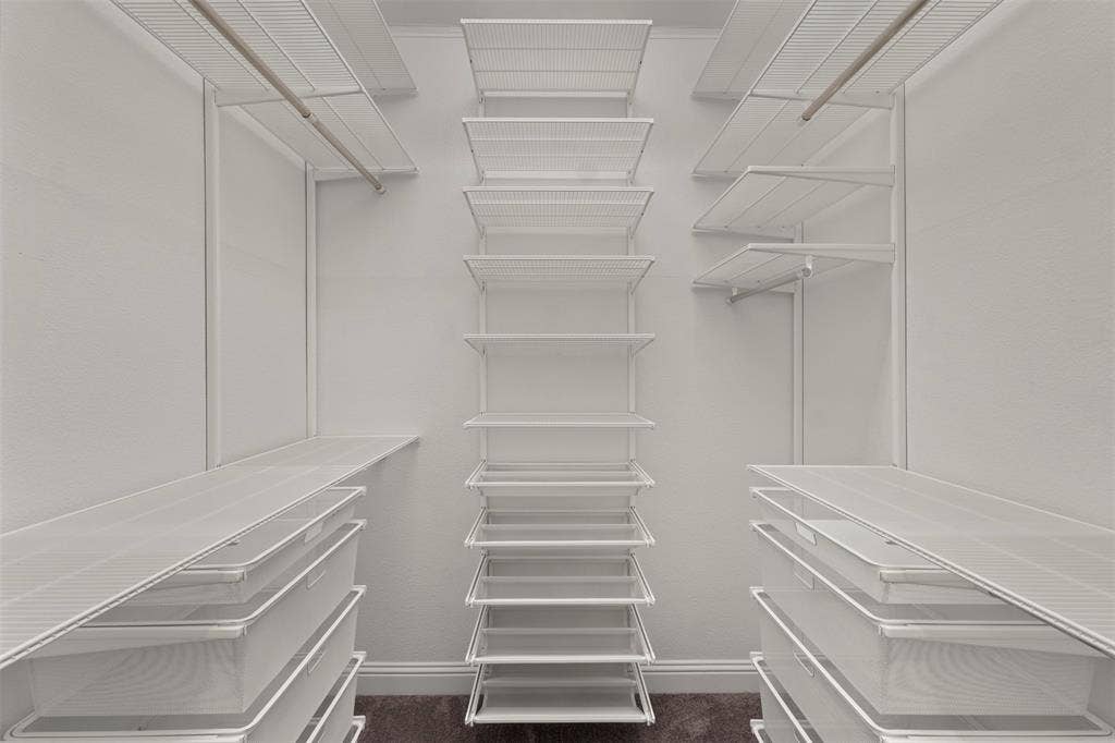 8028 Hickory Branch Drive, Frisco, TX 75034 Integrated wire shelving system with hanging rods and pull-out drawers