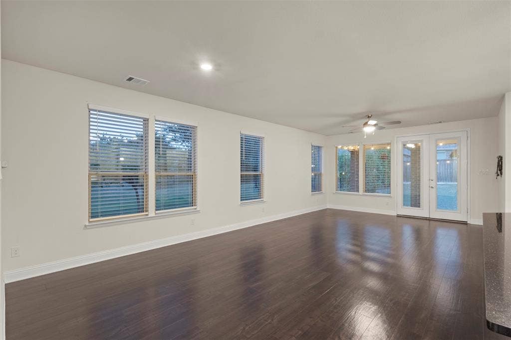 8028 Hickory Branch Drive, Frisco, TX 75034 Dark wood-finish flooring, recessed lighting, and white walls