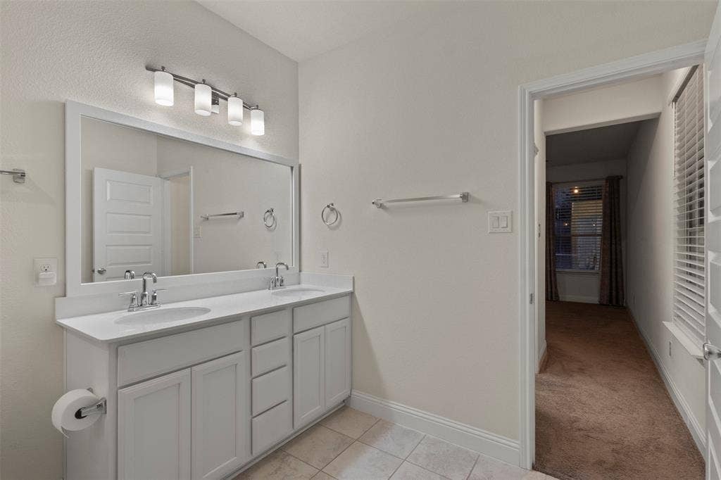 8028 Hickory Branch Drive, Frisco, TX 75034 Double vanity with undermount sinks and chrome fixtures