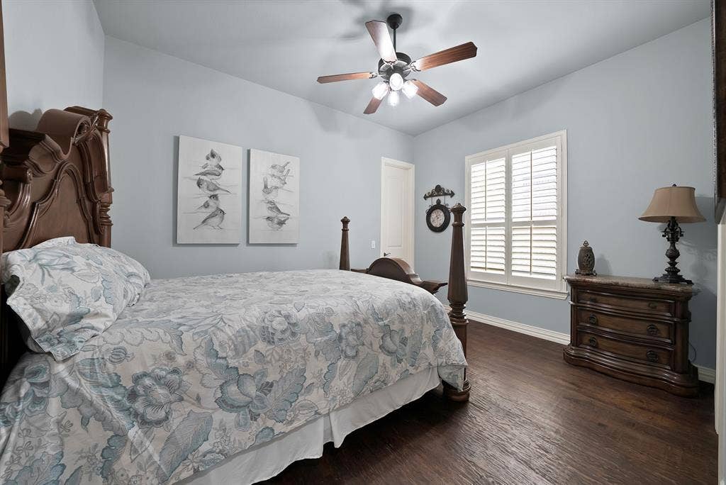 A spacious main-floor guest bedroom offers a comfortable and private retreat, perfectly suited for welcoming overnight guests or extended family.