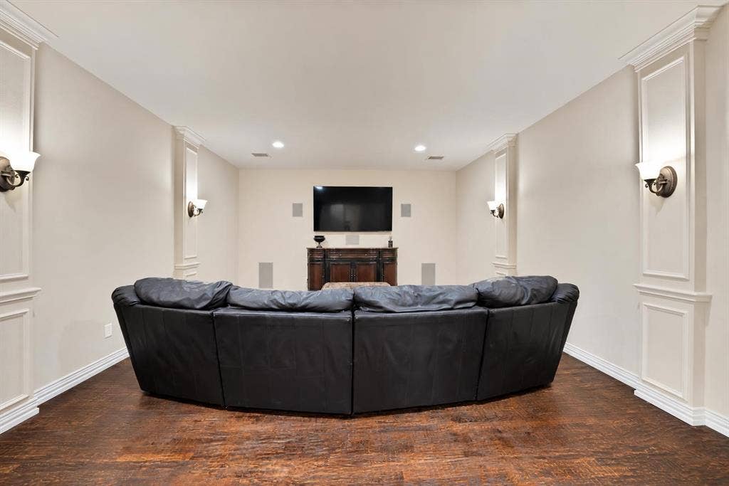 Upstairs, the media room sets the stage for unforgettable movie nights, game days, and entertaining, offering the perfect space to gather, relax, and enjoy your favorite moments together.