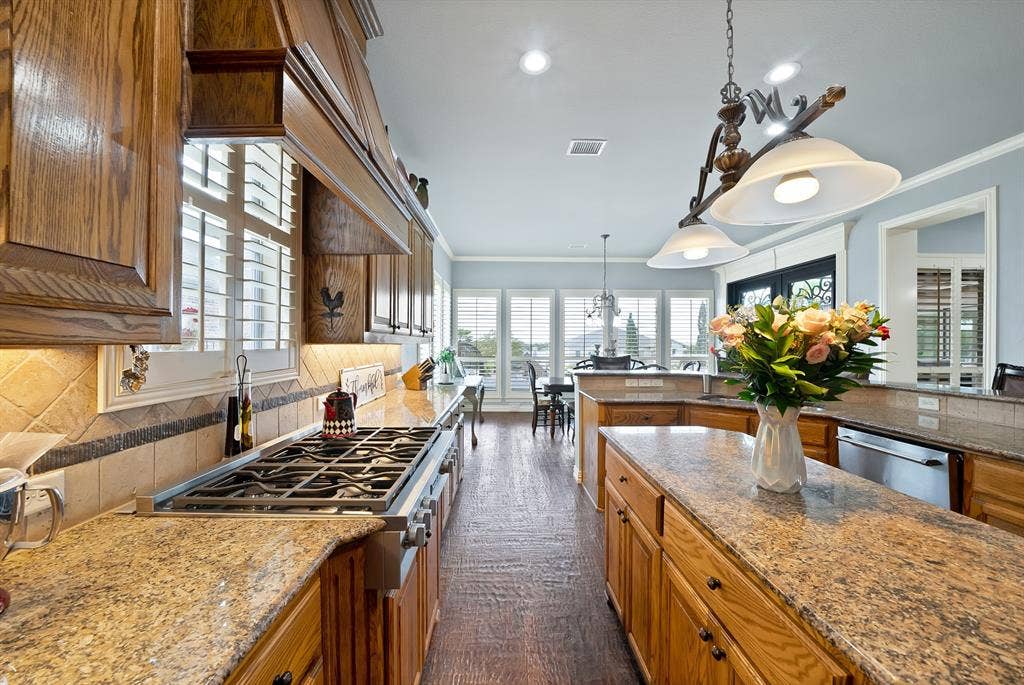 Whether indulging your culinary creativity, gathering with family, or entertaining for the holidays, this exceptional kitchen is truly the heart of the home.