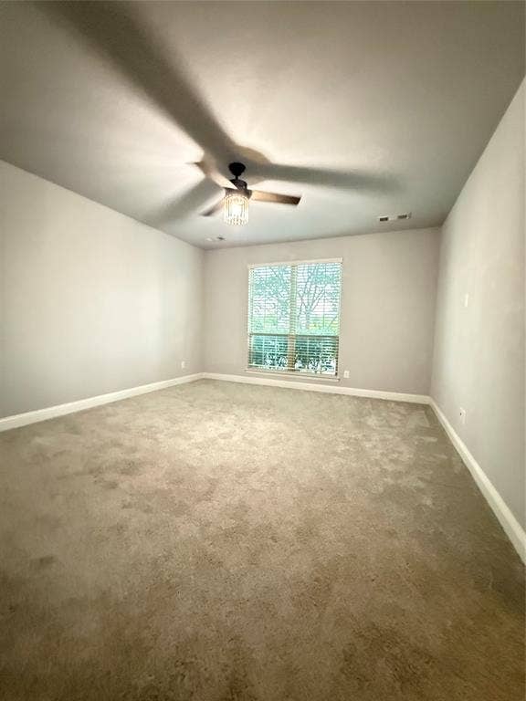 11818 Antler Drive, Frisco, TX 75035 Recessed window with blinds, ceiling fan, and wall-to-wall carpeting