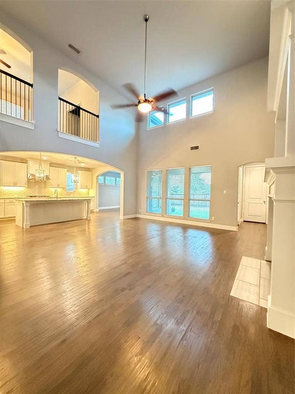 11818 Antler Drive, Frisco, TX 75035 Vaulted ceilings, wood-finish flooring, and an open-concept layout