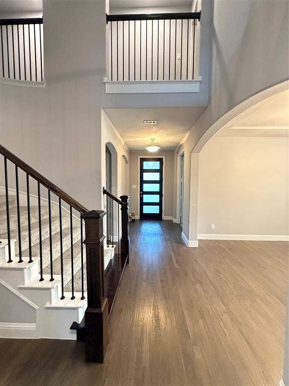 11818 Antler Drive, Frisco, TX 75035 Hardwood flooring extending through the hallway and main living area