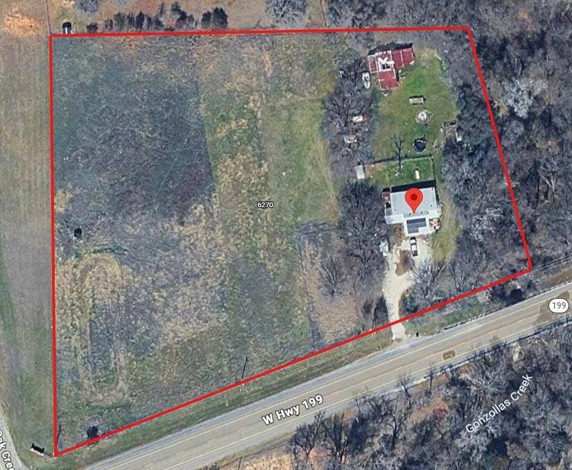 6220 W Highway 199, Springtown, TX 76082 Aerial Site Plan. Outlining the property boundaries and surrounding geographical features