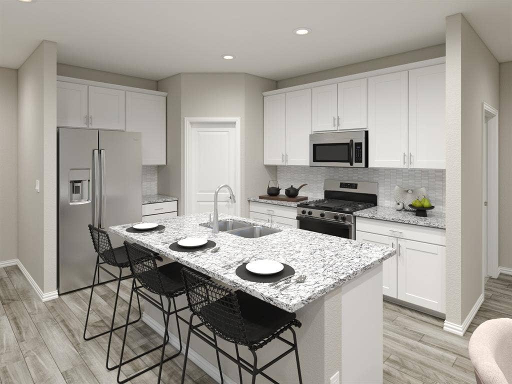 13235 Piney Woods Drive, Rowlett, TX 75089 Photo is not of the actual home, but is an inspirational photo of builder’s model home and may depict options, furnishings, and/or decorator features that are not included.