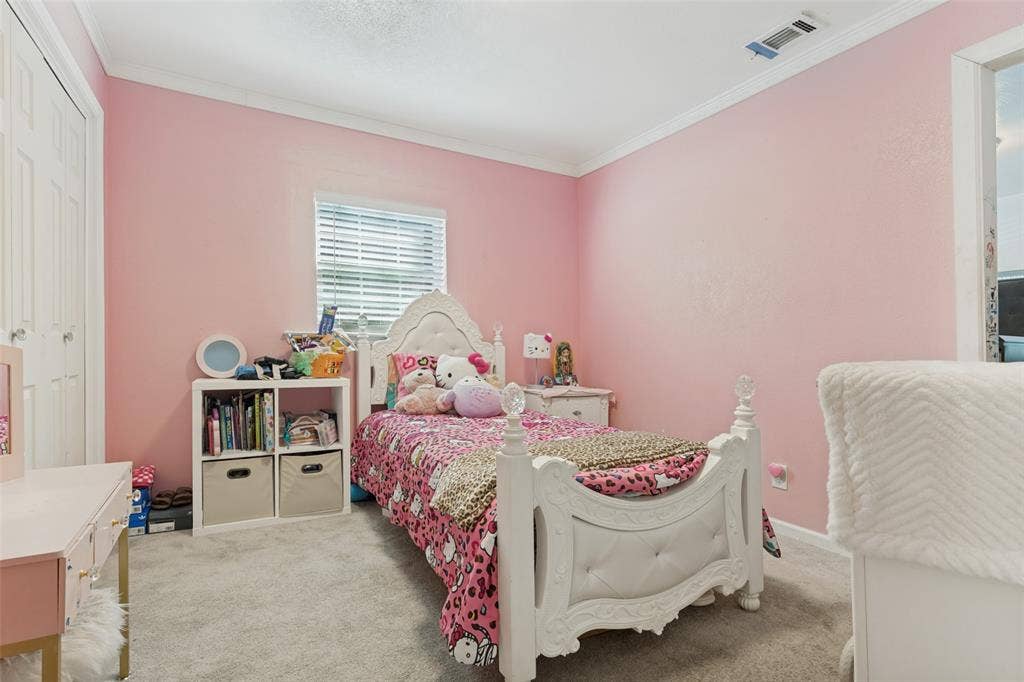 1522 Carroll Drive, Garland, TX 75041 Room featuring neutral carpeting, a single window with horizontal blinds, and double-door closet storage