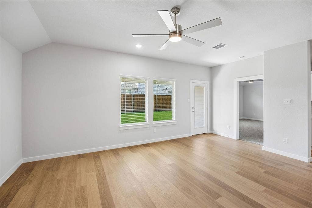 821 Talmadge Avenue, Aledo, TX 76008 Living Room in the Oscar home plan by Trophy Signature Homes – REPRESENTATIVE PHOTO