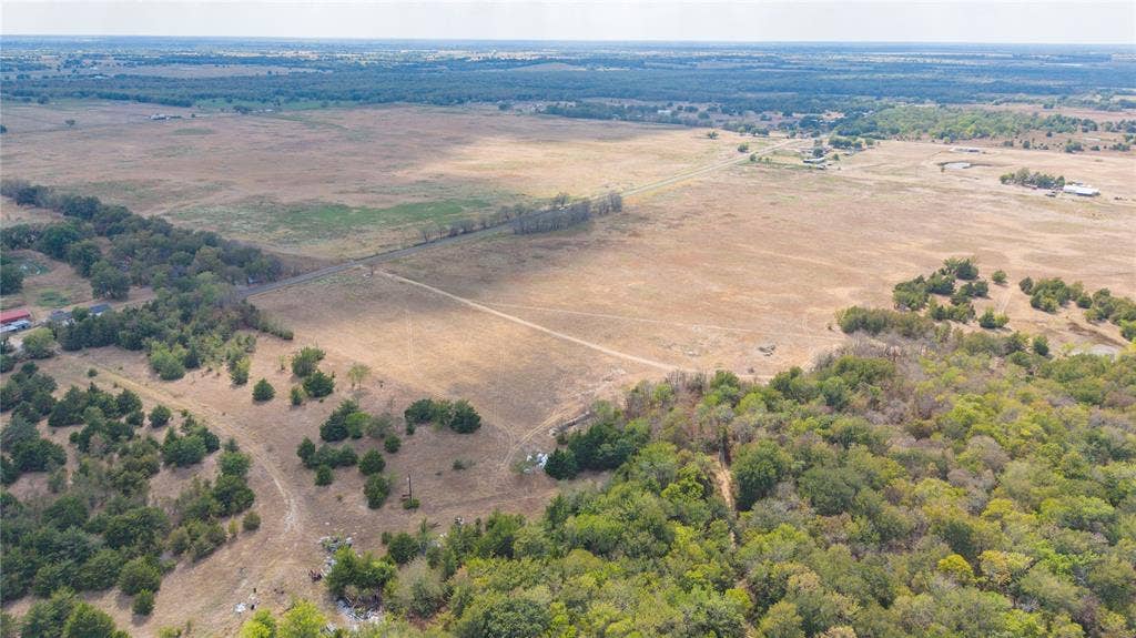 15 Acres County Road 4605, Commerce, TX 75428 View from the back of the property looking south and west