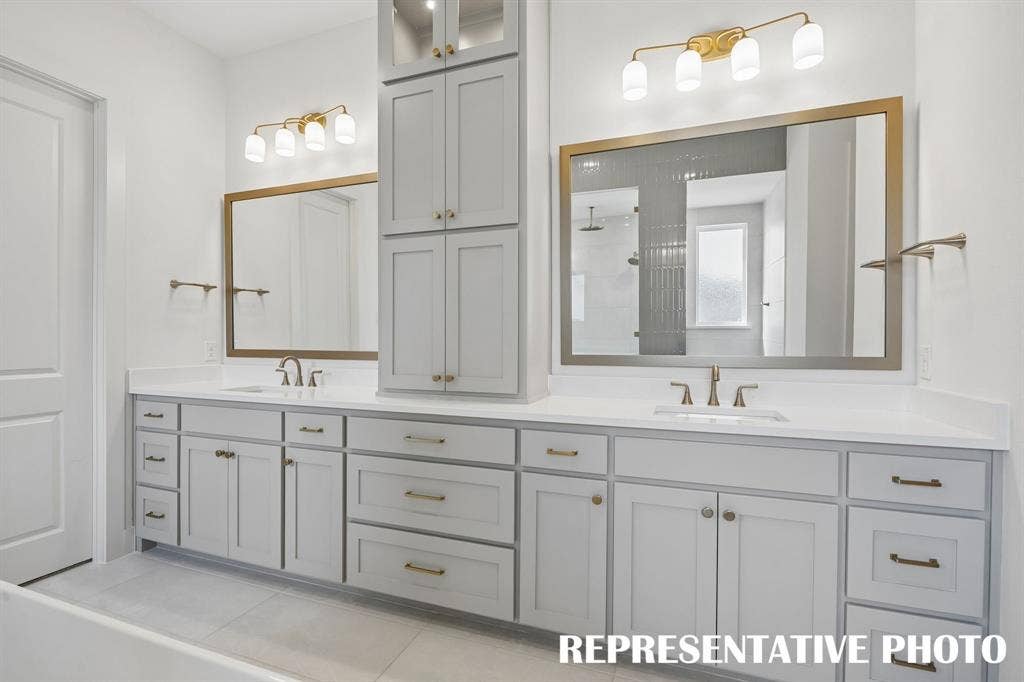No shortage of style or space in this elegant owner's bath.  REPRESENTATIVE PHOTO