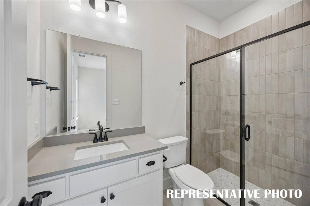 Friends and family will feel right at home in any of the beautifully finished guest baths our Kimball plan has to offer.  REPRESENTATIVE PHOTO