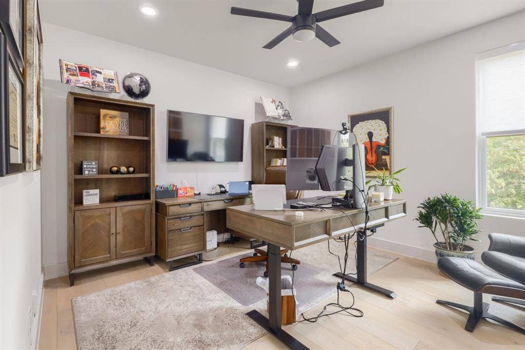 3950 Beechwood Lane, Dallas, TX 75220 Set Up as working from home office - Recessed lighting, light wood-finish flooring, ceiling fan, large window, and built-in shelving unit