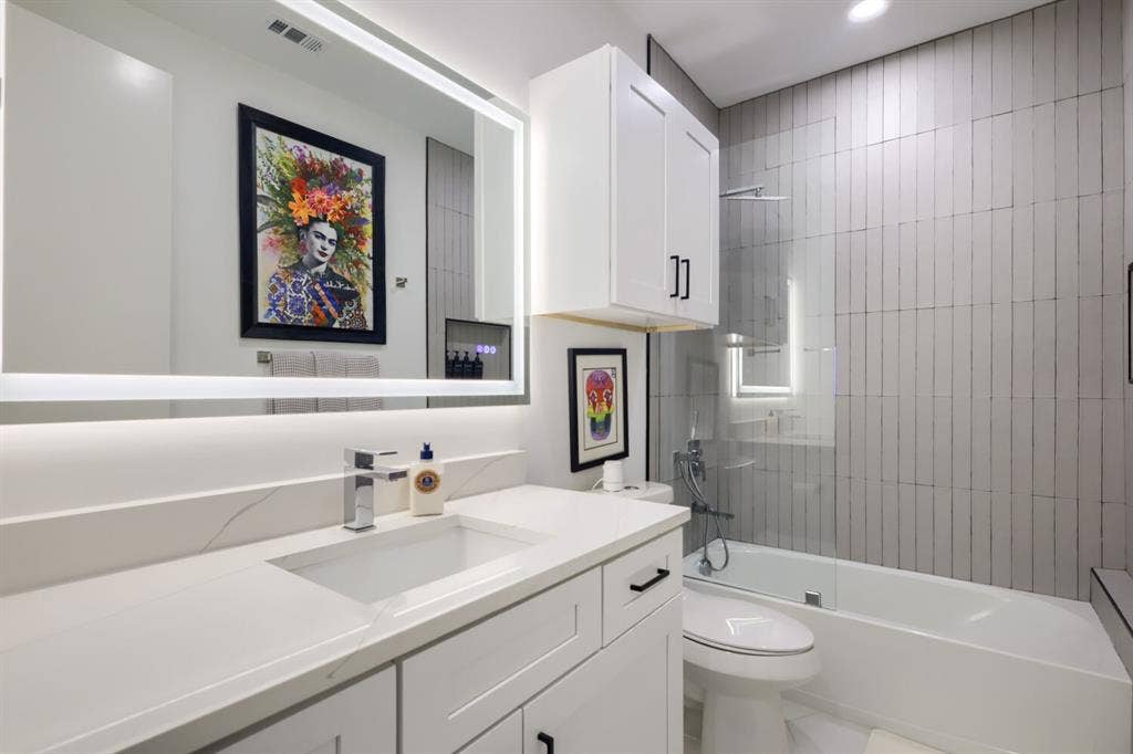 3950 Beechwood Lane, Dallas, TX 75220 Integrated vanity with undermount sink and quartz-finish countertop