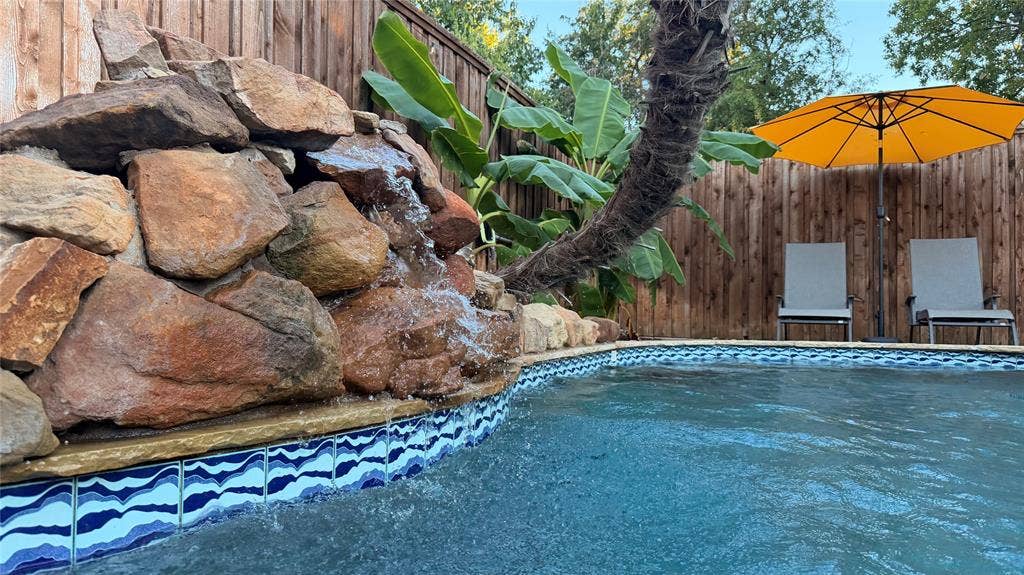 6416 Andora Drive, Plano, TX 75093 Heated pool with spa/waterfall is spring/summer-ready.