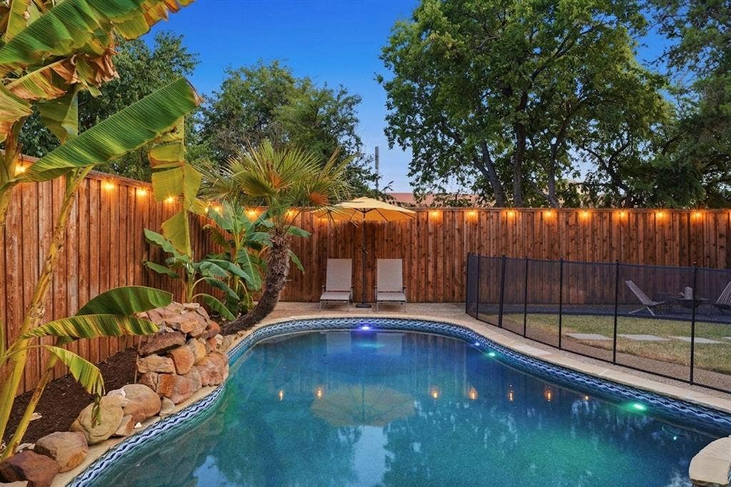 6416 Andora Drive, Plano, TX 75093 View of pool with waterfall.