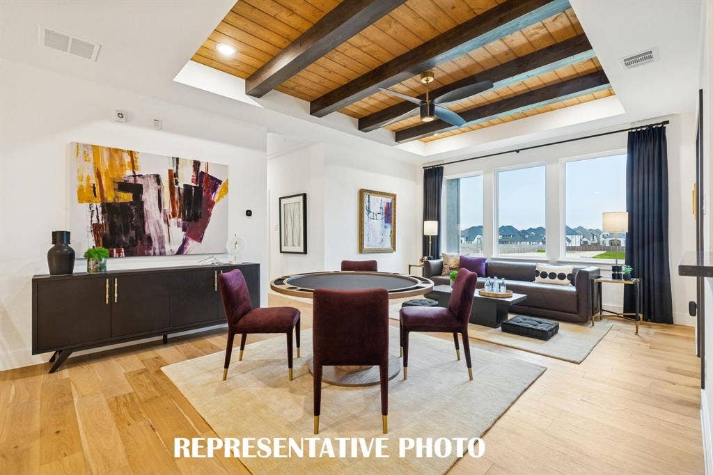 Light, bright and inviting, this wonderful game room offers an outstanding space for family fun time!  REPRESENTATIVE PHOTO
