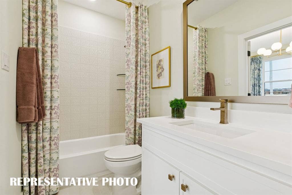 Friends and family will feel right at home in any of the beautifully finished guest baths offered in our Hayden plan.  REPRESENTATIVE PHOTO