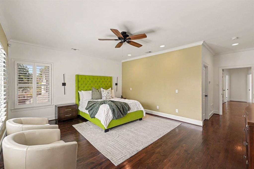 5542 Monticello Avenue, Dallas, TX 75206 Wood-finish flooring with crown molding, ceiling fan, recessed lighting, and window shutters