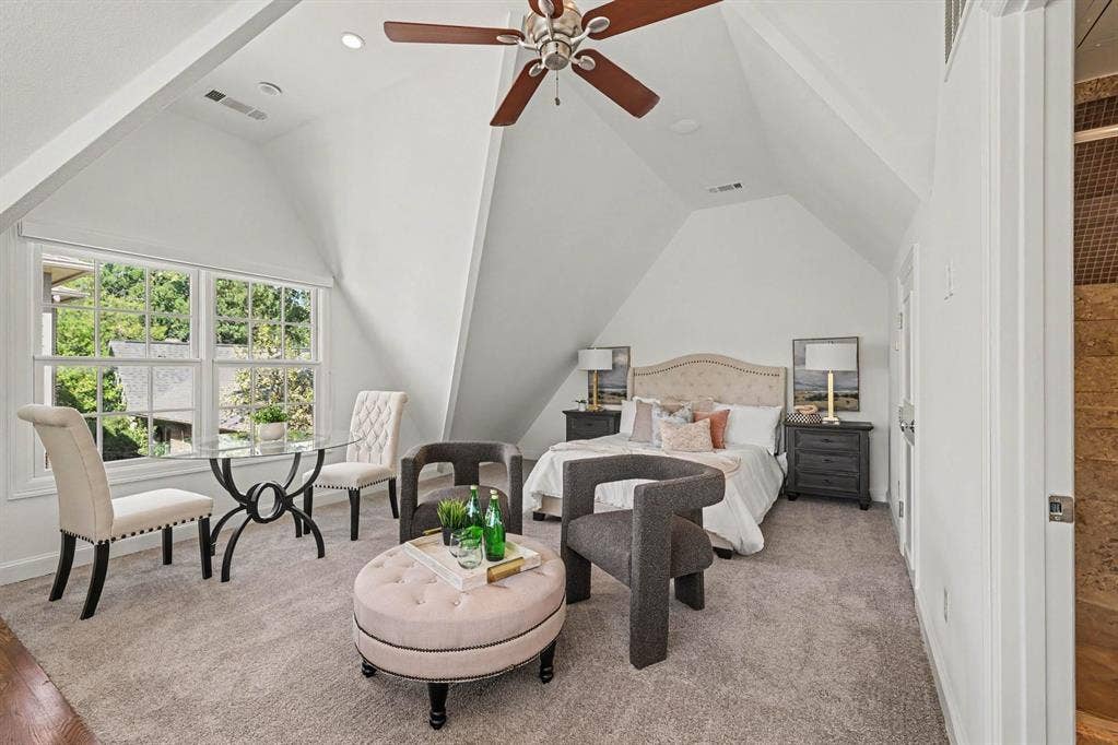 5542 Monticello Avenue, Dallas, TX 75206 Angled ceilings, double-hung windows, recessed lighting, ceiling fan, and carpeted flooring