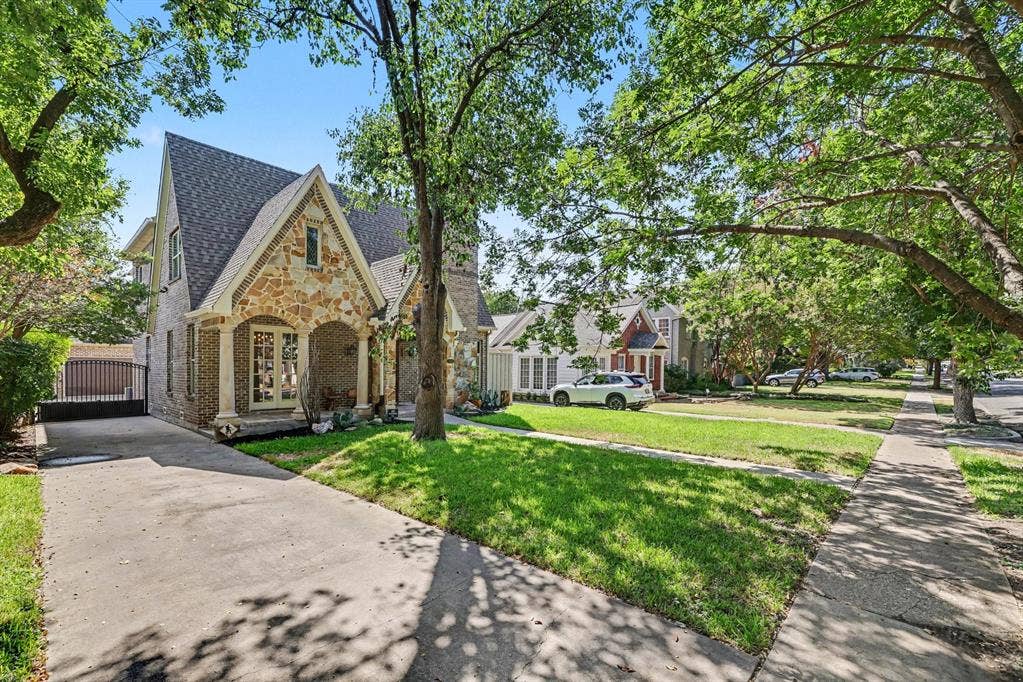 5542 Monticello Avenue, Dallas, TX 75206 Stone and brick facade with gabled roofline