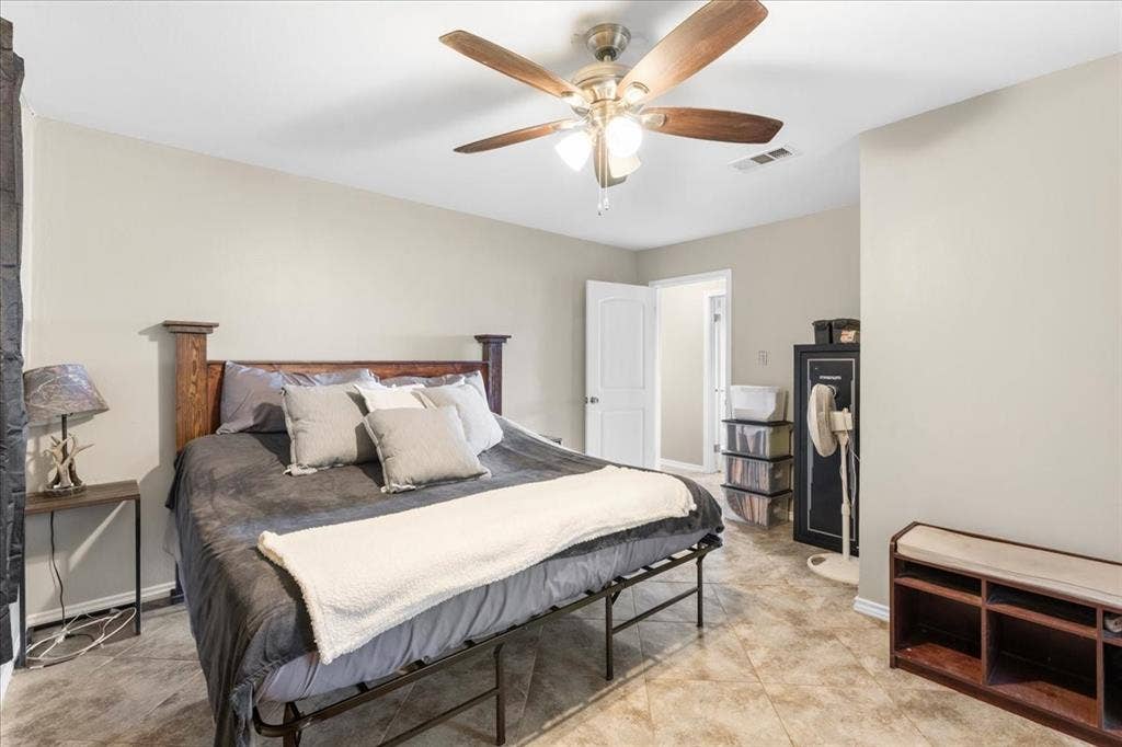 Recessed ceiling lighting, a ceiling fan with light fixture, and tile flooring