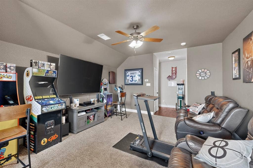 5020 Lindy Court, Midlothian, TX 76065 Carpeted room with a ceiling fan, recessed lighting, and sloped ceilings